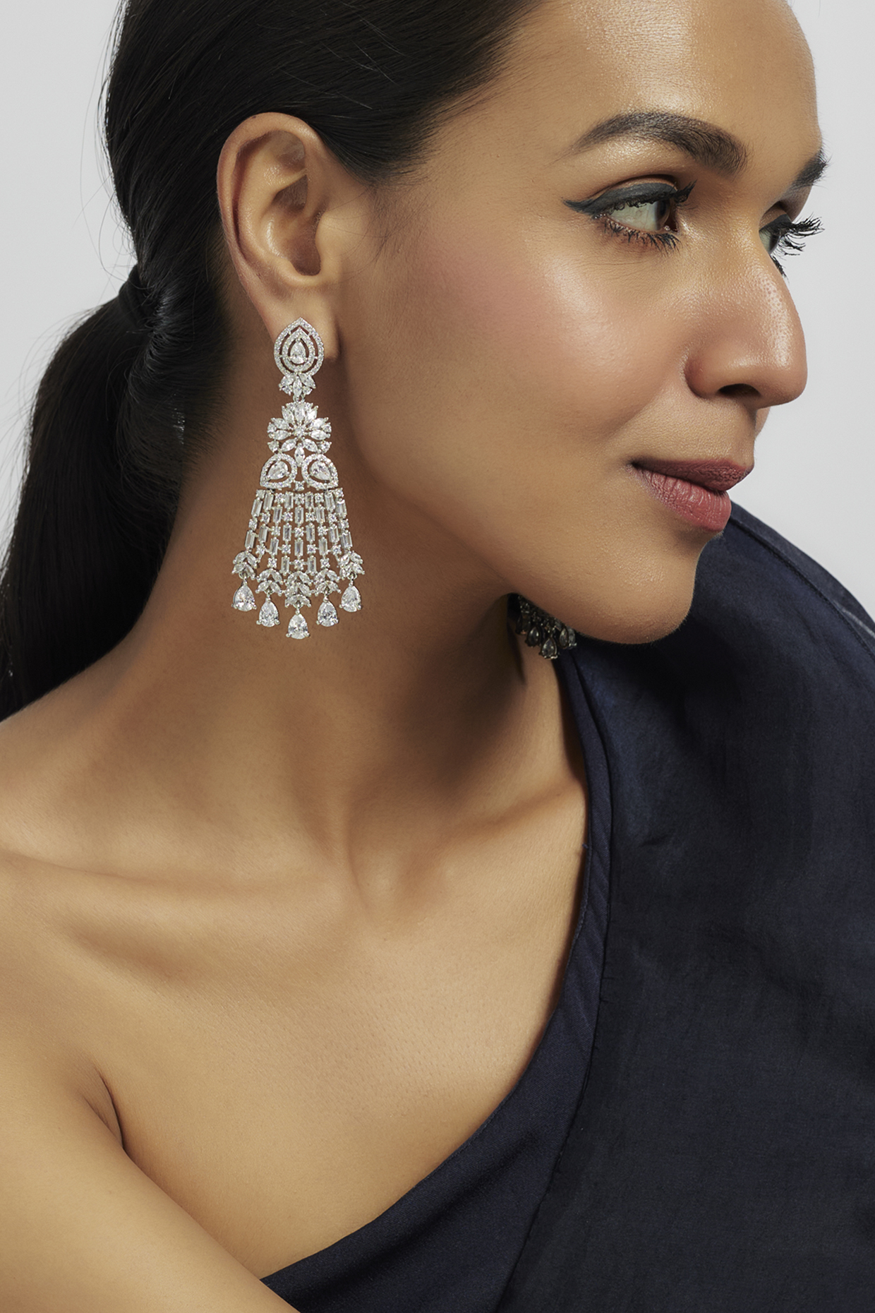 White Finish Zircon Dangler Earrings by Moh-Maya by Disha Khatri at Pernia's Pop Up Shop